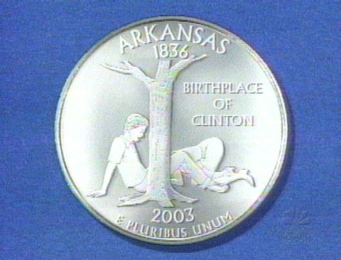 2003 Jeep TJ - This coin commemorates Arkansas as the birthplace of Clinton and shows the year 2003.