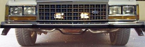 1985 Ford Crown Victoria LTD - The front grille and headlights of a 1985 Ford Crown Victoria LTD are visible in this registry photo.