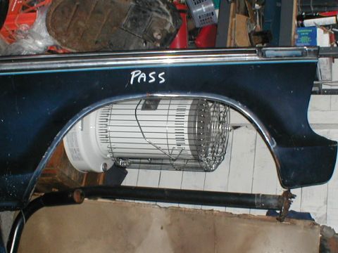 1979 Ford Bronco - A dark blue fender, possibly from a 1979 Ford Bronco, is shown with the word 'PASS' written on it.