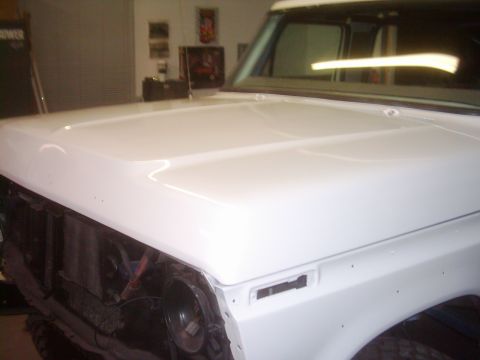1978 Ford Bronco - Front view of a white 1978 Ford Bronco, showing the hood and fender.