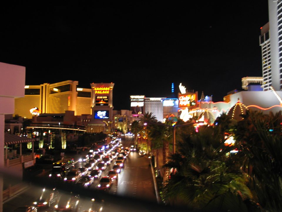 Traffic jam on the Las Vegas Strip at night with casinos lit up