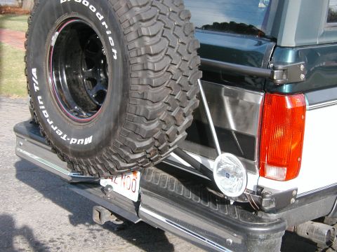 1994 Ford Bronco - Ford Bronco spare tire and bumper detail. Model year appears to be early 1990s.