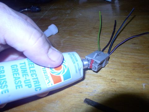 1986 Ford Bronco - Now stuff the plug with dielectric grease to keep future corrosion from starting and promote conductivity as well as making it easy to slid…