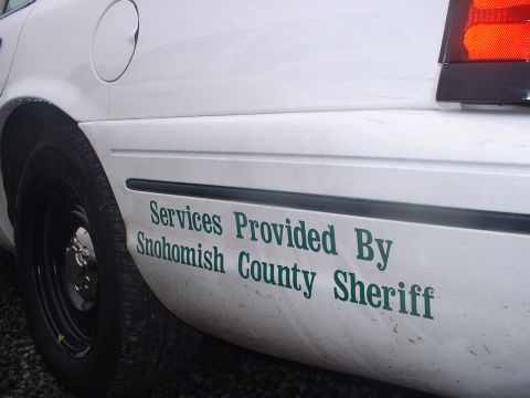 1999 Ford Crown Victoria - Rear side view of a 1999 Ford Crown Victoria, marked for Snohomish County Sheriff services.