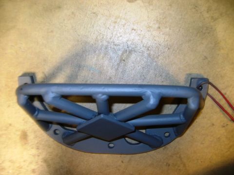 1985 Ford Bronco - Custom tubular front bumper with reinforcement and wires visible.
