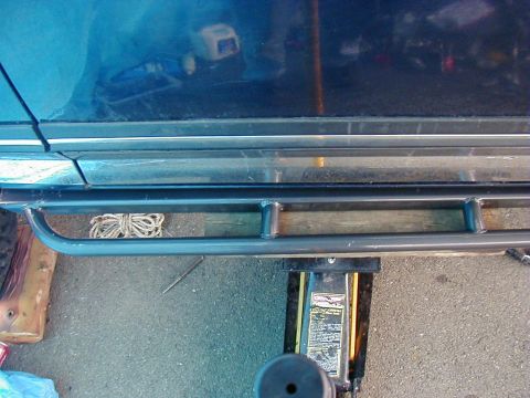 1991 Ford Bronco - Custom slider bar mounted below the rocker panel of a vehicle.