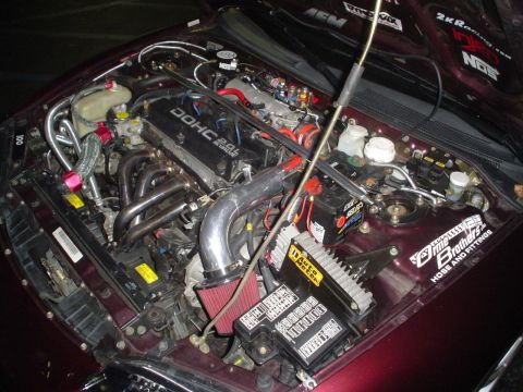 1993 Ford Taurus - The engine bay features a DOHC 2.0L 16 valve engine with various aftermarket performance modifications.