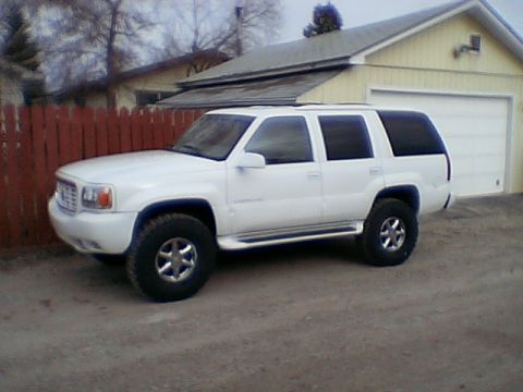 1999 Cadillac Escalade - Check out the fence now