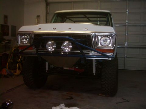 1978 Ford Bronco - This 1978 Ford Bronco is equipped with a custom blue bull bar and dual auxiliary lights on its front end.