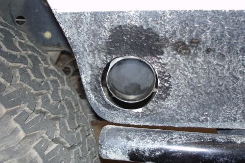 1987 Ford Bronco - I used a 3" hole saw to cut the fender. The exhaust shop did a good job of centering the pipe.