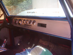 1978 Ford Bronco - Interior view of a vehicle's dashboard, showing a custom gauge panel.