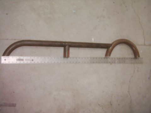 1978 Ford Bronco - Metal rock slider part shown with a ruler for size reference. Supermotors.net logo is present.