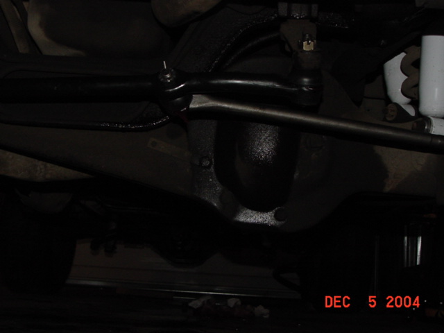 Underside view of front differential and steering linkage on a 1989 Ford Bronco, dated Dec 5 2004