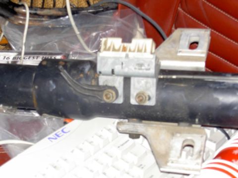 1988 Ford Bronco - Close-up of a steering column ignition switch assembly, likely from an older vehicle.
