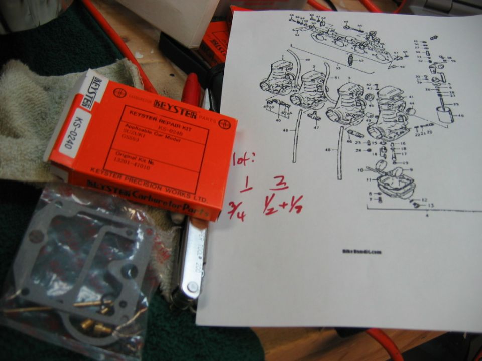 Box for a Keyster carburetor repair kit KS-0240, a bag with carburetor parts, and a diagram of carburetors