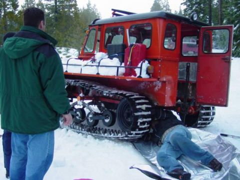 1986 Ford Bronco - fixing track on snowcat