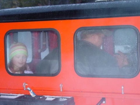 1986 Ford Bronco - hubby and kids going for a ride in the snowcat - since we helped them out.