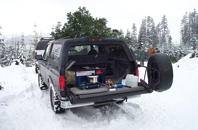 X-mas tree loaded, hanging out having a great time, heating up some Hot Chocolate on the camp stove.