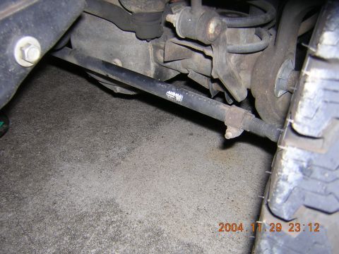 1984 Chevrolet Blazer - A close-up view of the rear suspension and tire assembly of a vehicle.