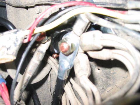 1988 Ford Bronco - Detail of starter motor wiring, showing copper terminals and various electrical wires.
