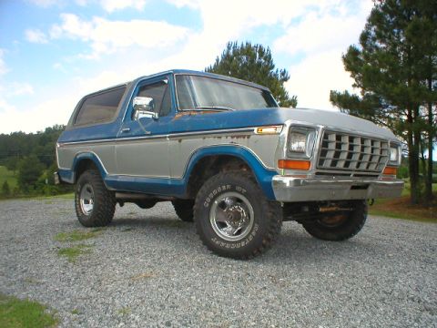 1978 Ford Bronco - This 1978 Ford Bronco features a distinctive grille and two-tone paint scheme, sitting on aftermarket wheels.