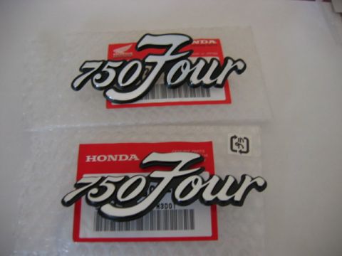 1985 Ford LTD Crown Victoria - Pair of NOS Honda 750 Four chrome emblems still sealed in red Honda Genuine Parts packaging with barcodes.