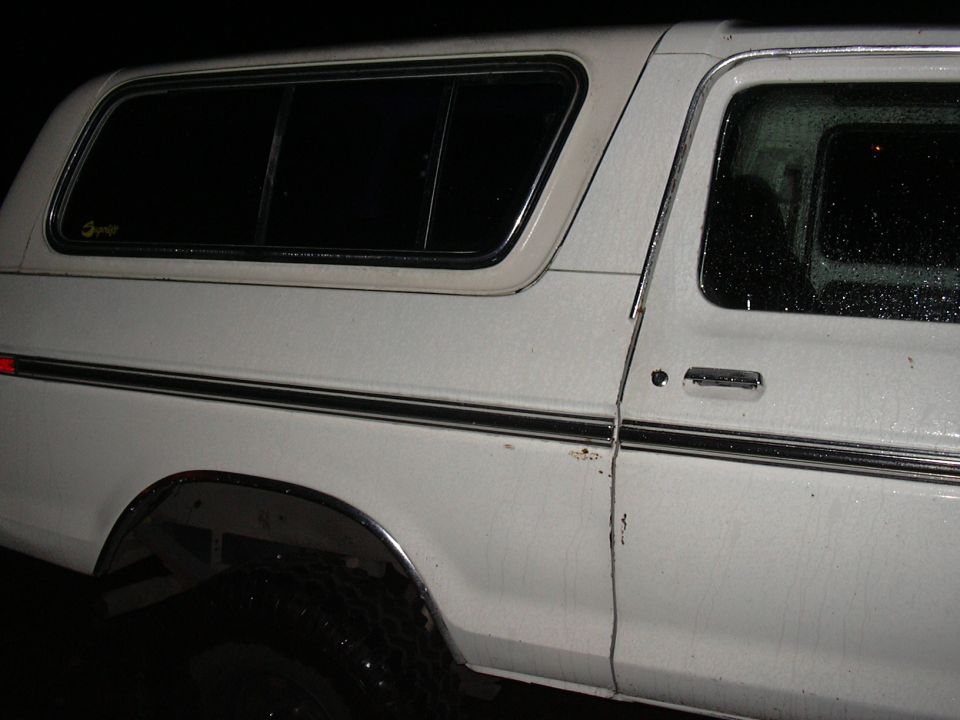 1978 Ford Bronco side view, white with black trim stripe