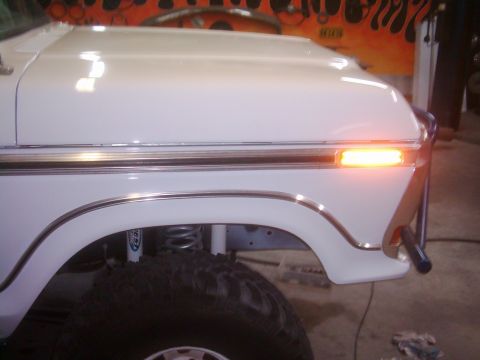 1978 Ford Bronco - Close-up of the front fender and turn signal on a 1978 Ford Bronco.