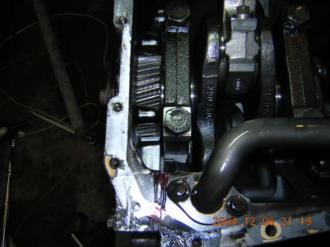 1984 Chevrolet Blazer - Close-up view of internal engine components, including crankshaft and connecting rods, with visible fluid.