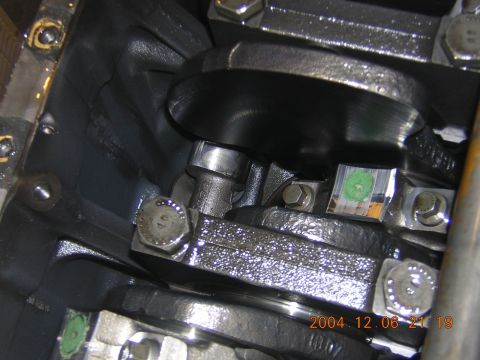 1984 Chevrolet Blazer - Close-up view of engine crankshaft and connecting rods, showing internal components.