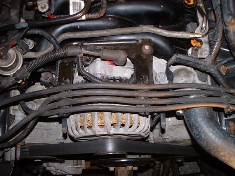 1996 Ford Crown Victoria - Close-up view of an engine bay, showing various components and wiring harnesses.