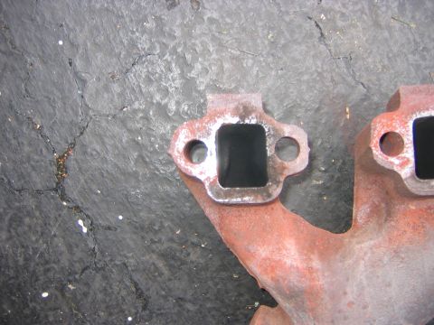 1995 Ford Bronco - You can see how t he stock manifolds go into a bottle neck right off the heads...ew