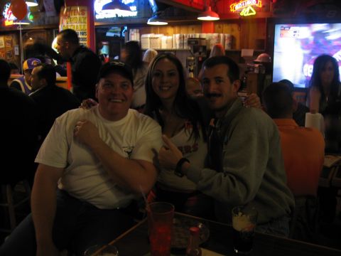 2002 Ford Taurus - A group of friends enjoy a night out at a lively bar.