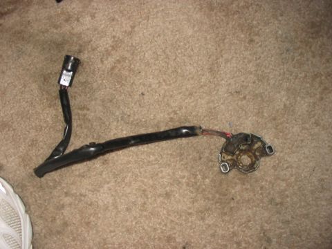 1988 Ford Bronco - A neutral safety switch with its wiring harness is shown, likely removed for repair or replacement.