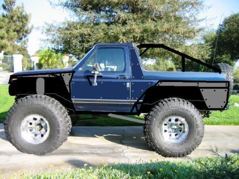1985 Ford Bronco - This modified Ford Bronco features oversized tires and custom bodywork, suggesting it's built for off-road use.