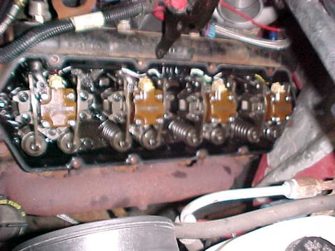 2000 Ford F-250 - Close-up view of an engine's internal components, focusing on the valve train mechanism.