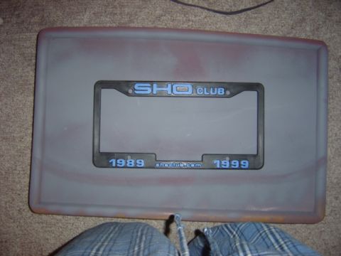 1998 Ford Taurus - A license plate frame for the SHO Club is shown, referencing years 1989 and 1999.