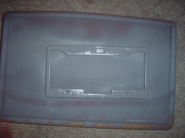 Gray license plate frame with "OHIO CLUB" text and "1985" visible