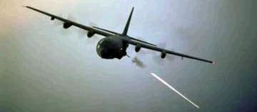 1988 Ford Bronco - A military transport aircraft is seen in the sky, releasing a flare.