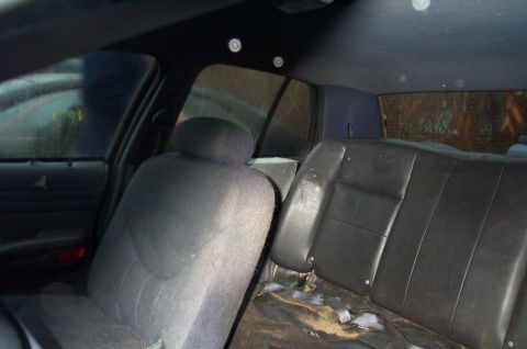 1991 Ford LTD Crown Victoria - Interior view of a 1991 Ford Crown Victoria LTD, focusing on the seats and door panel.