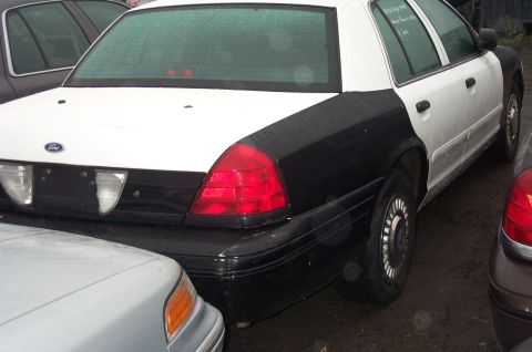 1991 Ford LTD Crown Victoria - This Ford Crown Victoria has a two-tone paint scheme, common for police vehicles.
