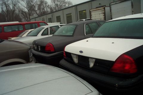 1991 Ford LTD Crown Victoria - Rear view of a 1991 Ford Crown Victoria LTD, showing its distinctive taillights and Ford emblem.