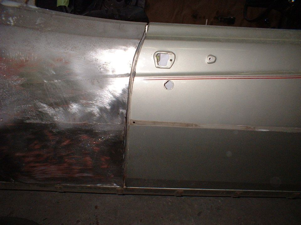 1971 Ford Torino side door panel with bodywork and trim strip