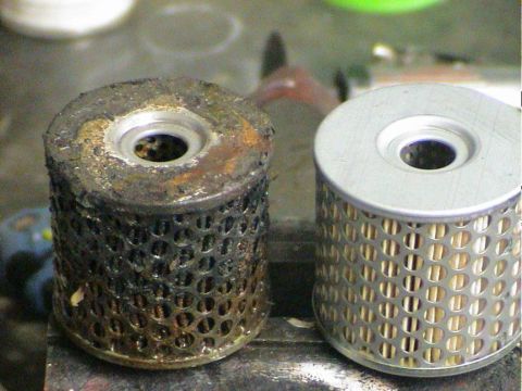 1979 Ford Bronco - Comparison of a dirty, used oil filter and a clean, new one.