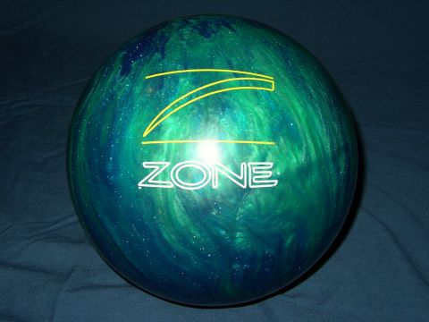 1987 Volkswagen Golf - A bowling ball with a swirling green and blue pattern is shown with the word ZONE in white lettering.