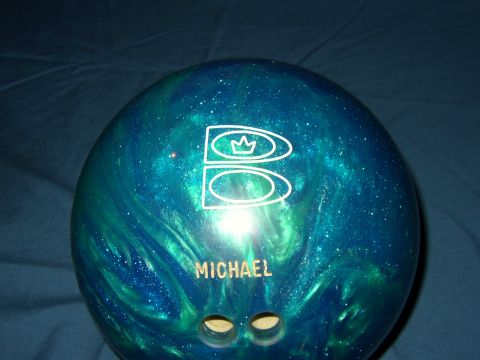 1987 Volkswagen Golf - A bowling ball with a galaxy-like pattern and personalized name is shown.