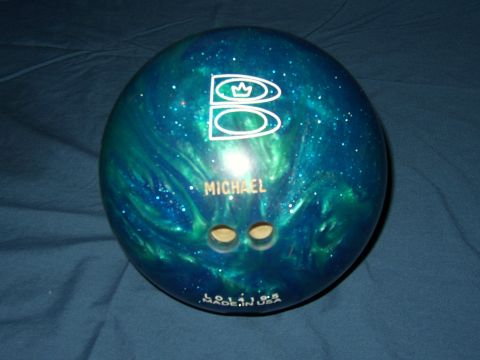 1987 Volkswagen Golf - A personalized bowling ball with a swirling blue and green pattern and the name MICHAEL is shown.
