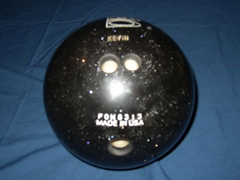 1987 Volkswagen Golf - Black bowling ball with personalized name and model number visible.
