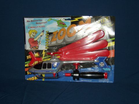 1987 Volkswagen Golf - This toy helicopter, labeled 'Tornado', is displayed in its original packaging.
