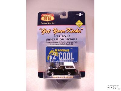1979 Ford Bronco - A 1980 Ford Bronco die-cast collectible is displayed in its original packaging with a Kansas license plate.